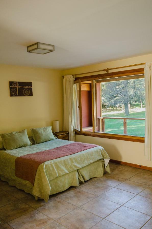 Unquehue Apartamentos Dormis Вилья-ла-Ангостура Экстерьер фото